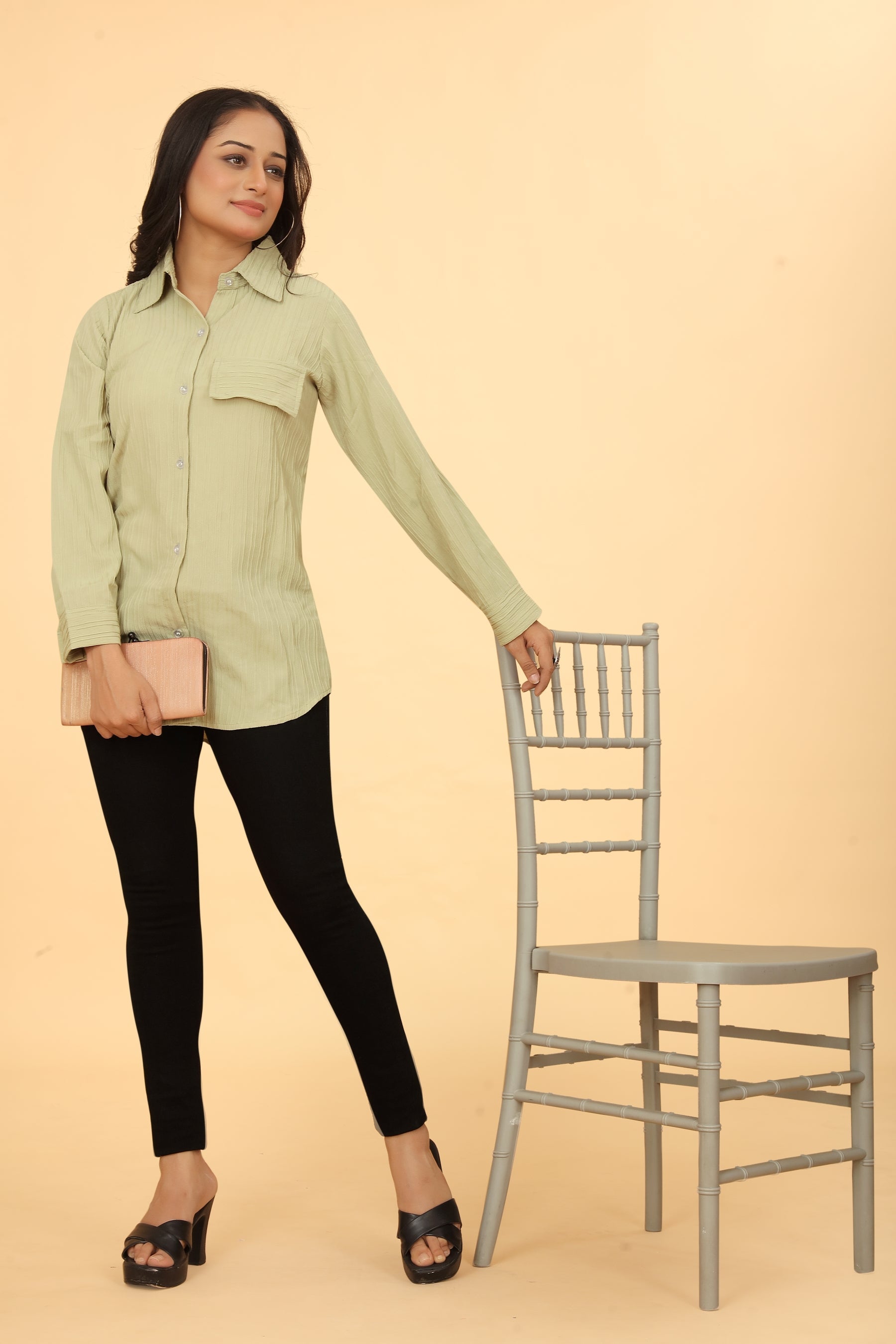 Woman wearing a Pista button-down collar neck top