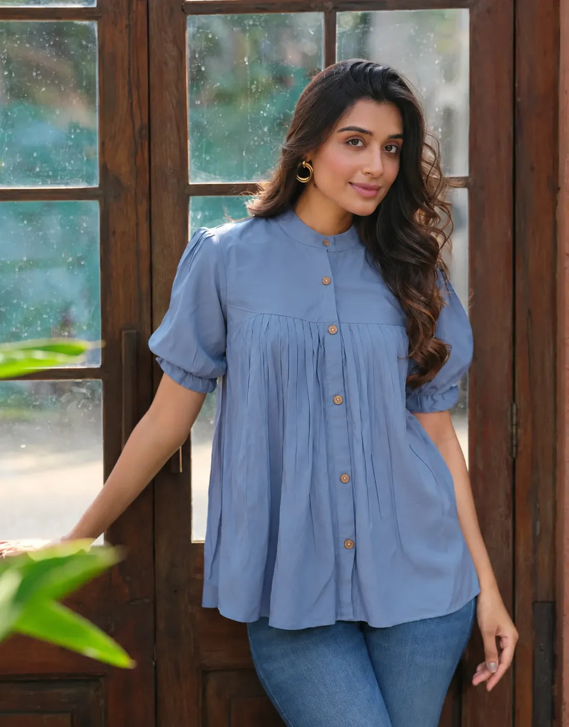blue pleated button top