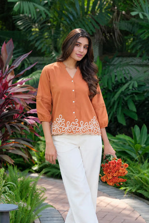 burnt orange embroidered top