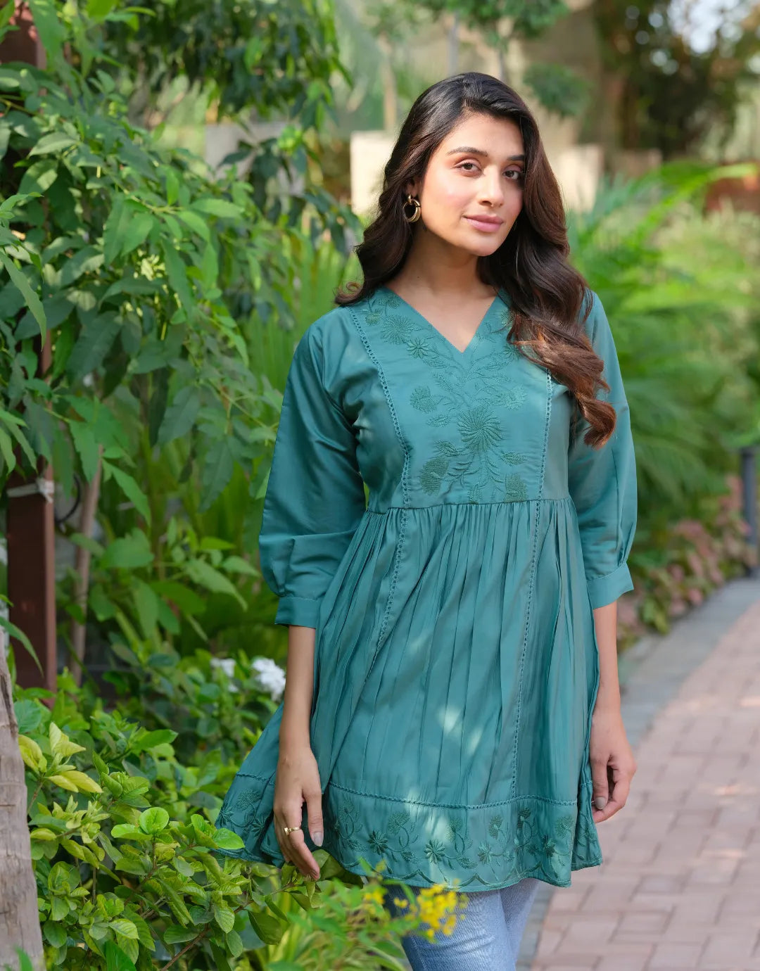 green pleated top