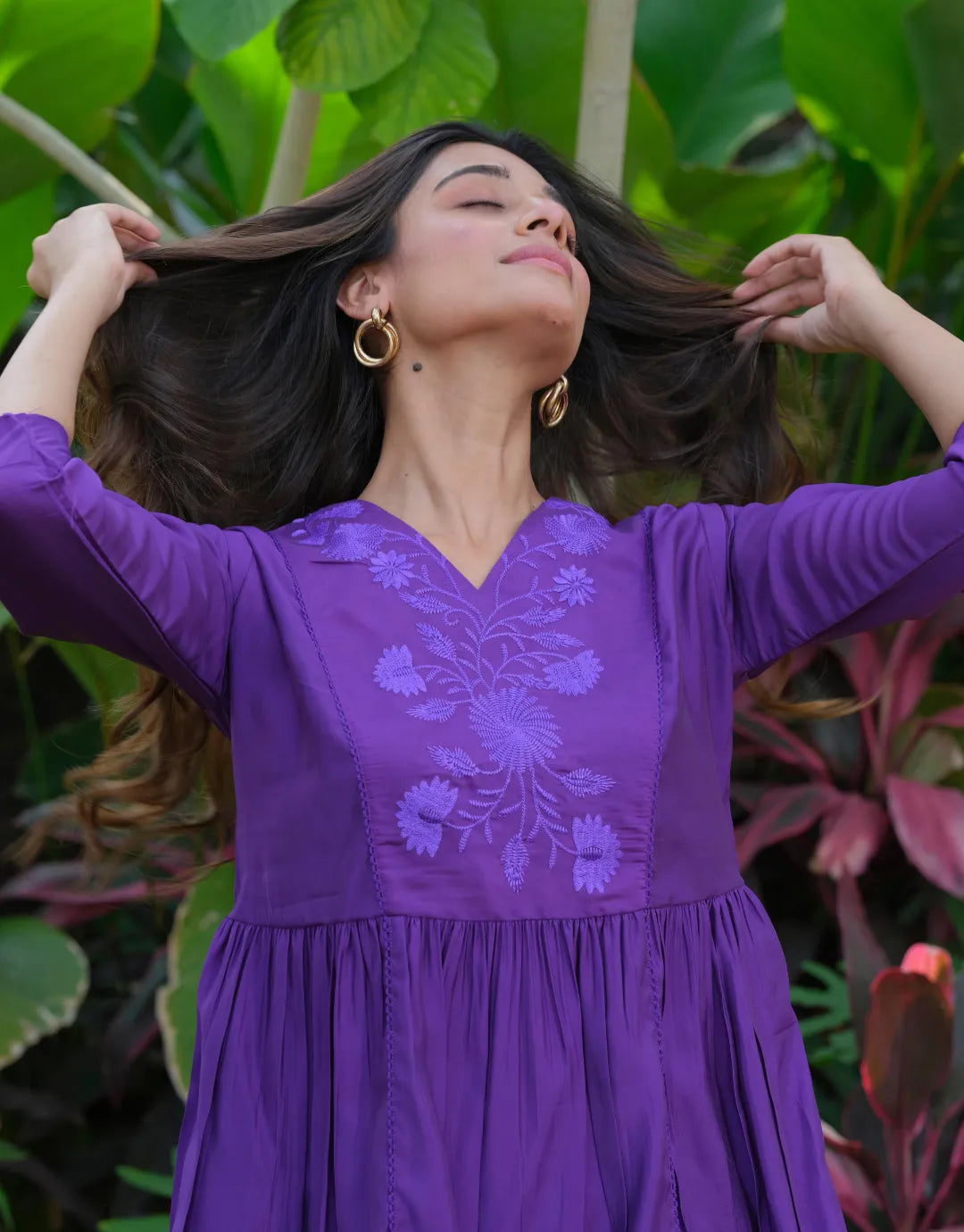 purple embroidered flared top