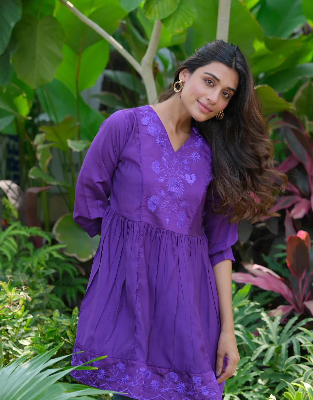 purple floral embroidered top