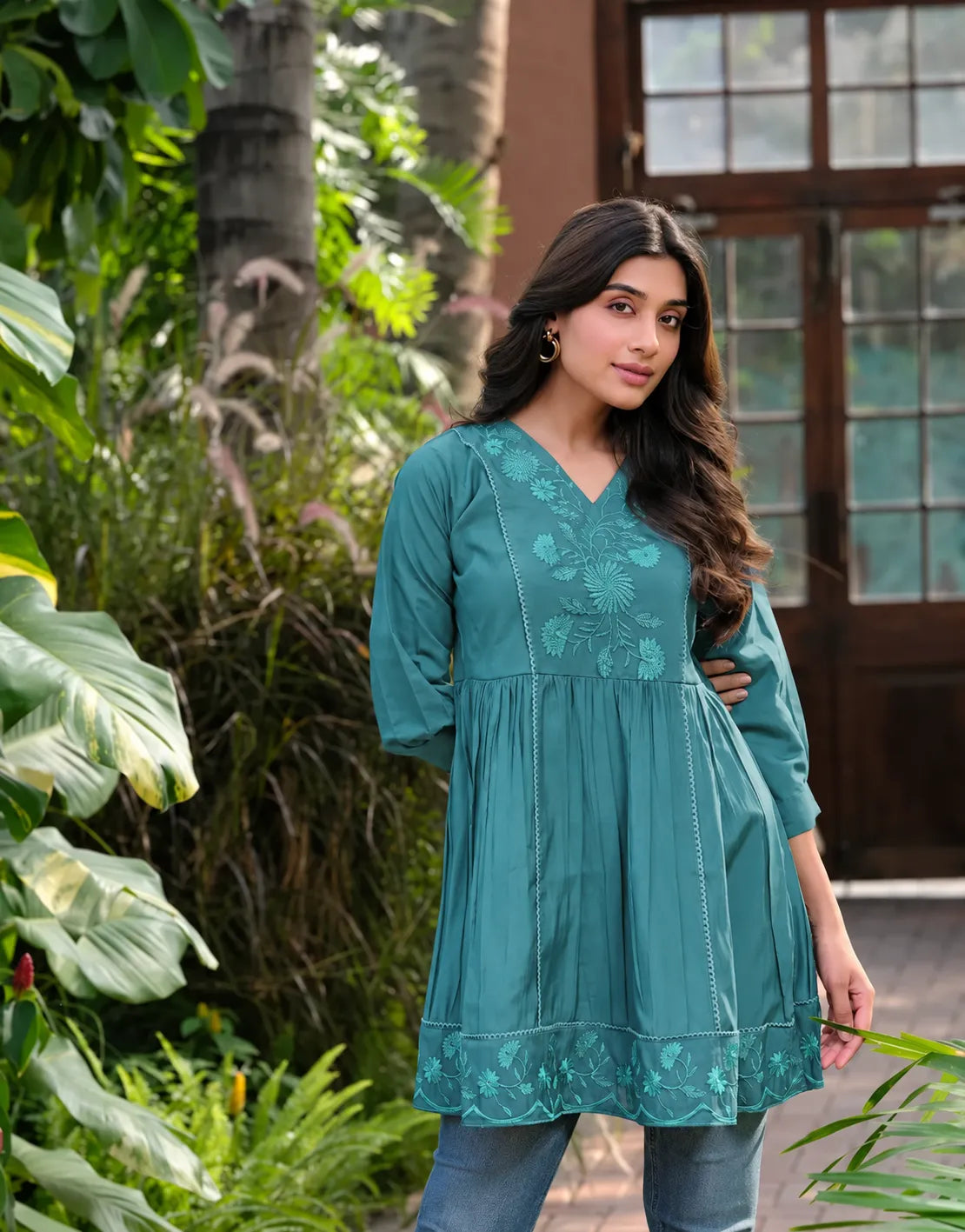 teal green embroidered top